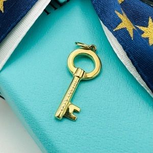 RETIRED Tiffany & Co. Modern Keys Open Round Mini Key Pendant in 18K Yellow Gold